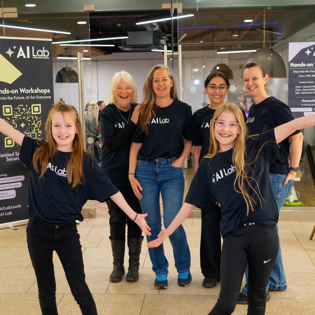 AI Lab community members wearing AI Lab t-shirts at a hands-on session